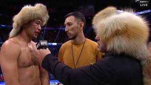 Joe Rogan wears traditional Kazakh headdress while interviewing Shavkat Rakhmonov