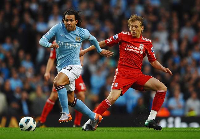 Carlos Tevez glides past Lucas Leiva. (Image Credit: Getty)